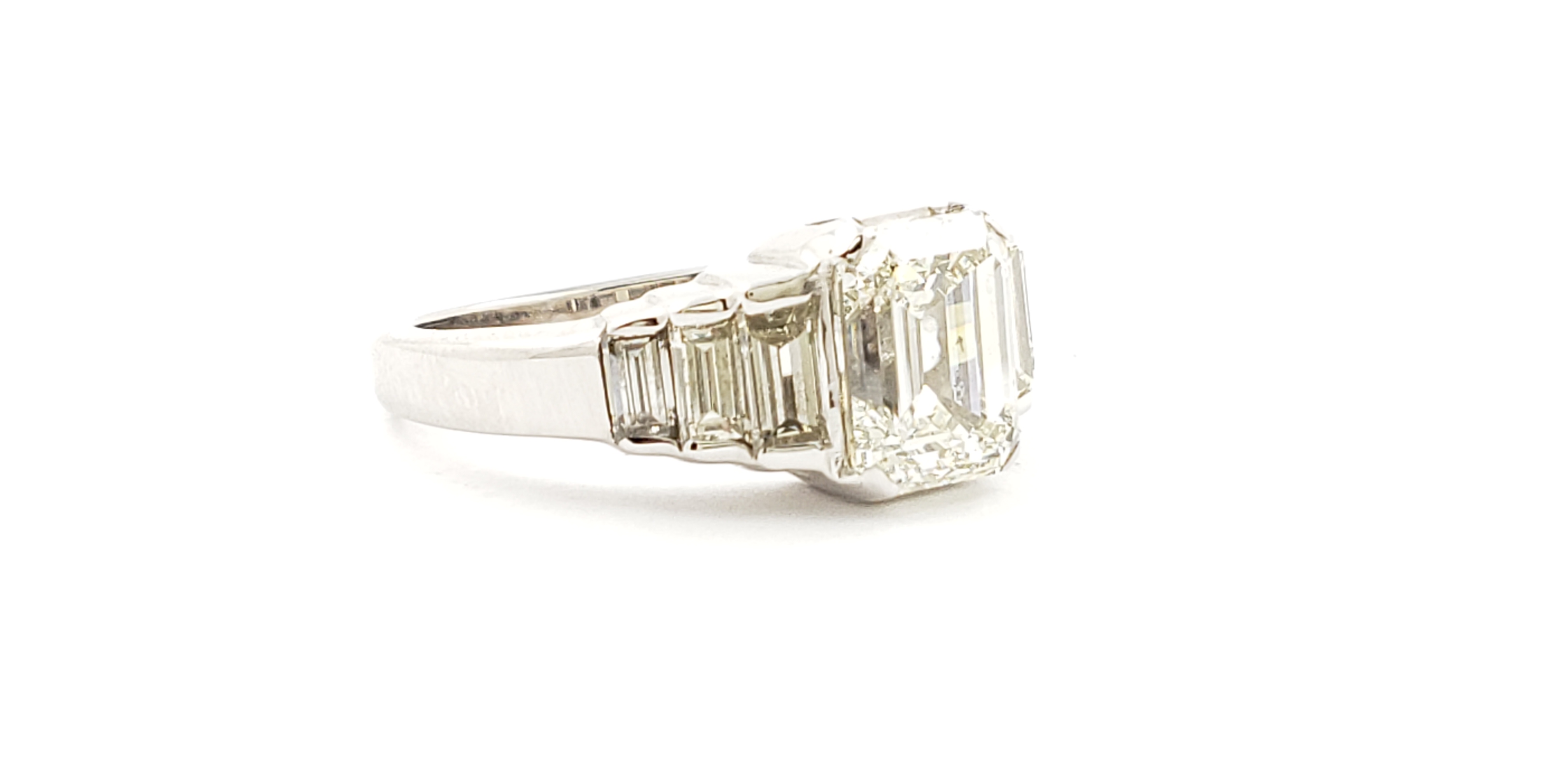 Emerald Cut Diamond Ring with Side Baguette Shape Diamonds